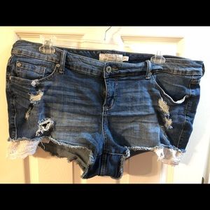 Torrid shorts with destruction and lace